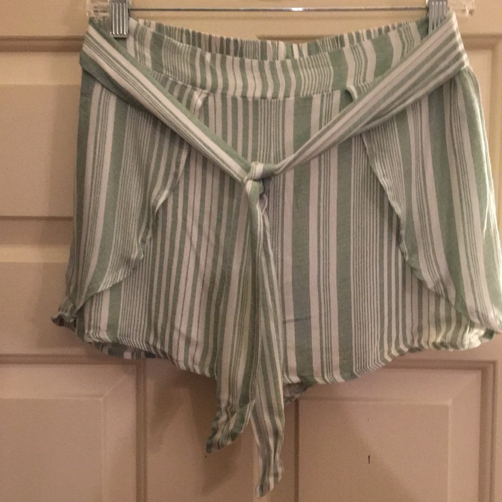 New with tag green and white striped short.